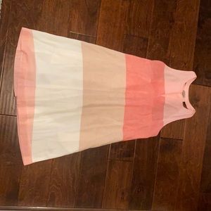 Linen sundress with fun back! Lined with pockets!